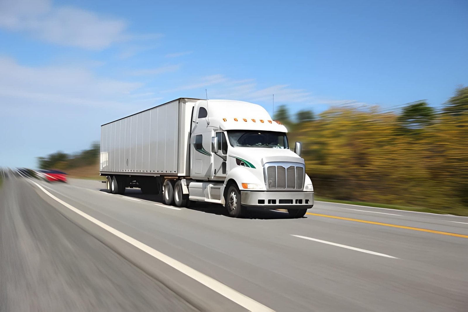 Semi truck moving at speed with motion blur